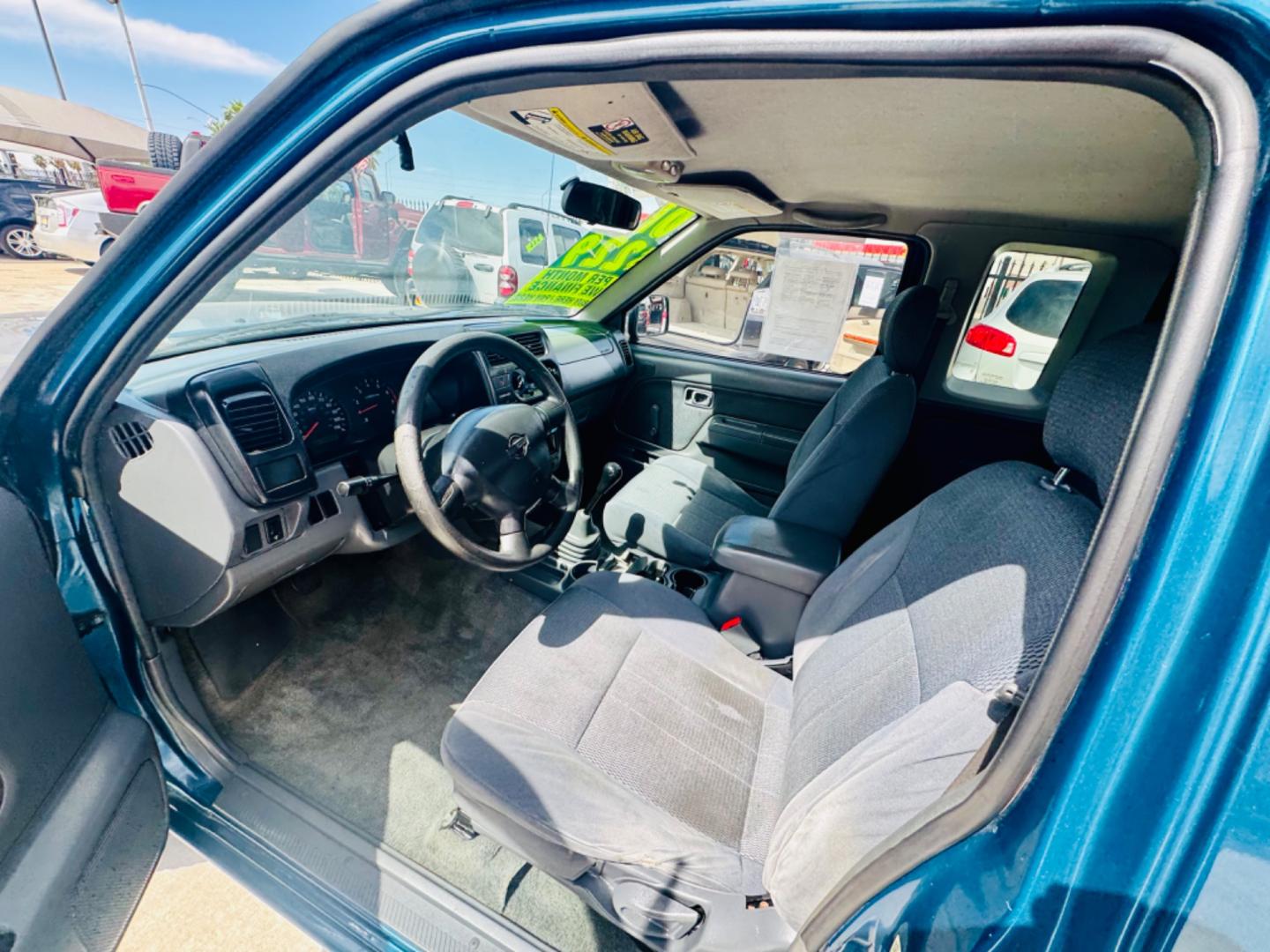 2001 Blue Nissan Frontier (1N6DD26S41C) , located at 2190 Hwy 95, Bullhead City, AZ, 86442, (928) 704-0060, 0.000000, 0.000000 - 2001 Nissan frontier xe king cab. 4 cylinder. 142k miles. Manual . Ice cold ac. Lots of extras done to truck . New tires new radiator. Fully serviced. New clutch, new brakes, pads. Runs and drives great. Financing available. In house financing .buy here pay here - Photo#13